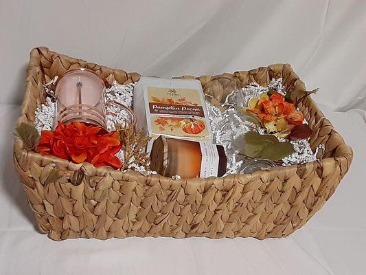 A beautiful Fall gift basket featuring a classy brass and glass French press and tasty Pumpkin Pecan Coffee