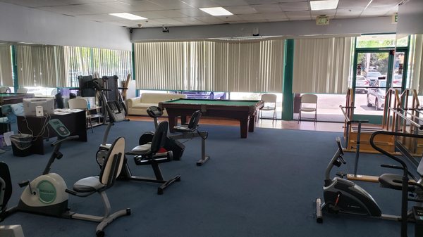 Pool Table and Exercise Equipment