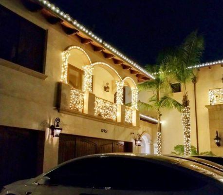 Roof line, balcony, palm trees and bushes decoration with  Led warm white lighs.