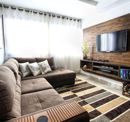 Built-in TV console and backdrop made out of specialty lumber