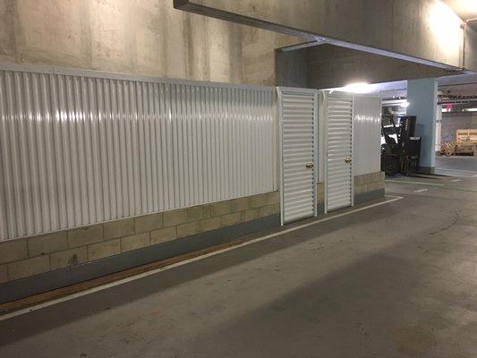 Self storage units in Condo parking garage.