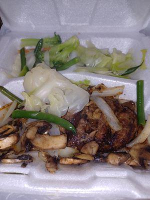 Chop steak with grilled onions and mushrooms, fresh vegetables and mashed potatoes.