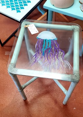 Beach combing find, turned into a hand painted jellyfish table