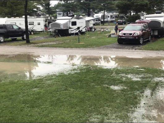 Flooded roads every time it rains. This is just outside the bathroom facilities.