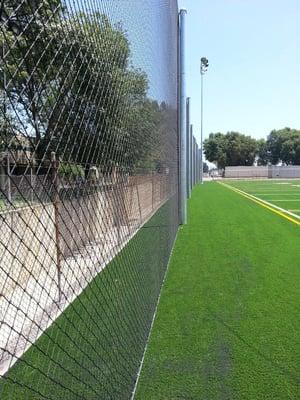 Soccer field: ball containment netting