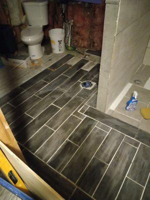 Walk in shower and bathroom  floor ceramic tile  job