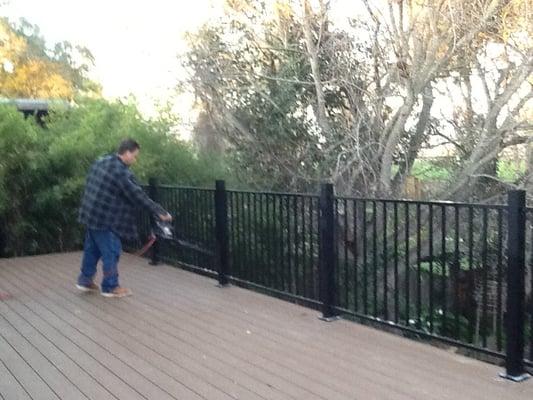 Chris Perko installing aluminum railings. Every day job site clean and tidy