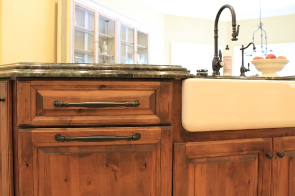 Custom island with farmhouse sink.