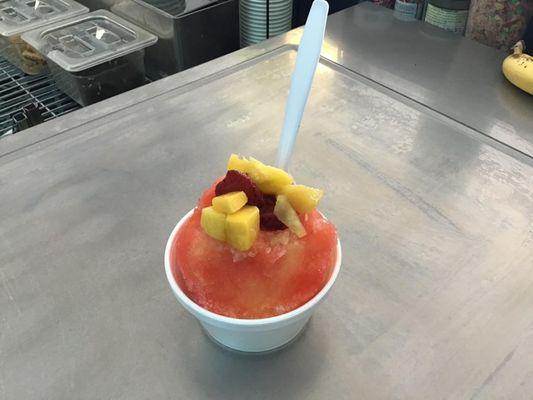 Shaved ice with fresh fruit added on top