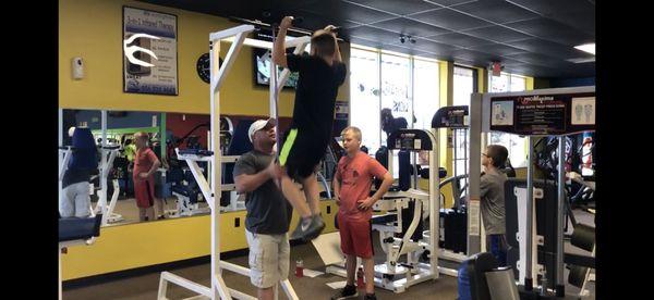 Working on pull-ups with our youth at our youth fitness classes