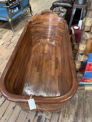 This cedar bathtub is now $10,500. Inflation!