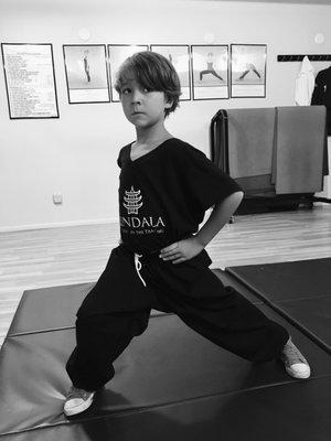 Stance training in the Kundala Youth Kung Fu with Jack Brando showing rift forward bow here.