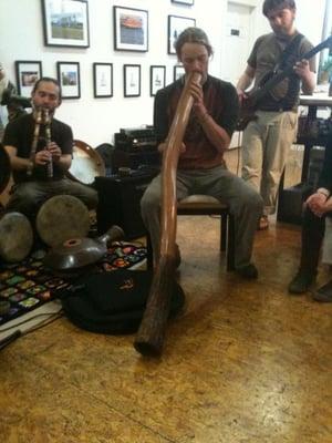 Musicians performing with digeridoo during the Bemis Spring Art Show