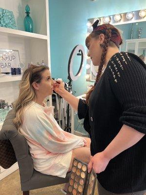 Heather doing Chelsea's Wedding Makeup