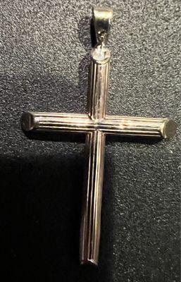 Cross of my late father that was broken but is now fixed