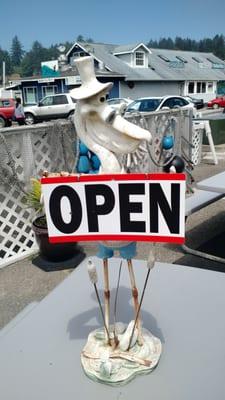 Mr. Peabody says " Come on in, we're Open! Out back of the Voodoo!