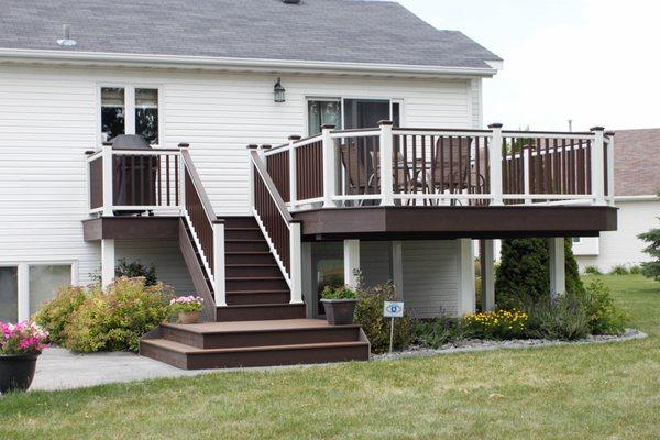 Trewx Spiced Rum decking with Transcends white railing.