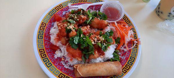 Sweet and sour chicken and it comes with egg roll.