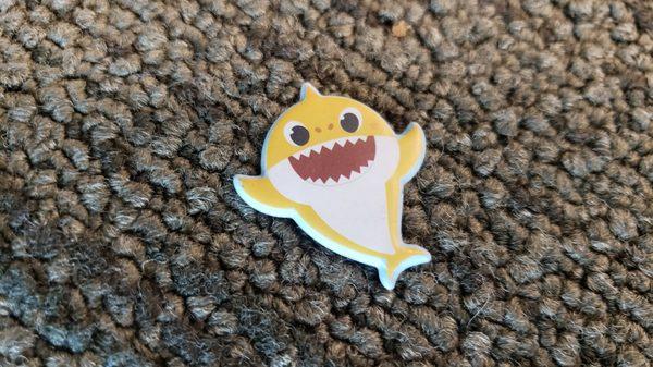 Found this cute sharkie on the carpet in charging room... hello to you, too! Thanks for the smile!