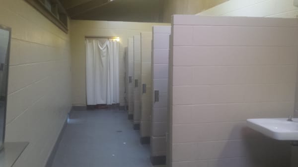 Toilets and shower stall.