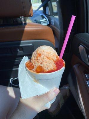 A small Tiger's Blood snow cone with cream