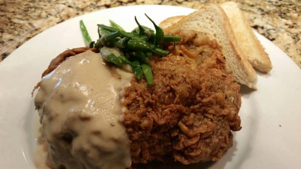 Chicken fried new york strip, mashed potatoes, sautéed green beans and country gravy. #wagongrill