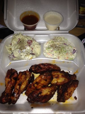 Smoked chicken wings with potato salad and coleslaw on the side so gooddddd