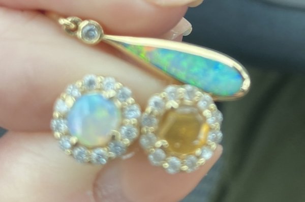 A picture is worth a thousand words. My $1600 opal earrings.