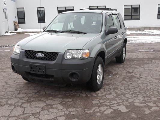 2005 Ford Escape 157,923 miles.