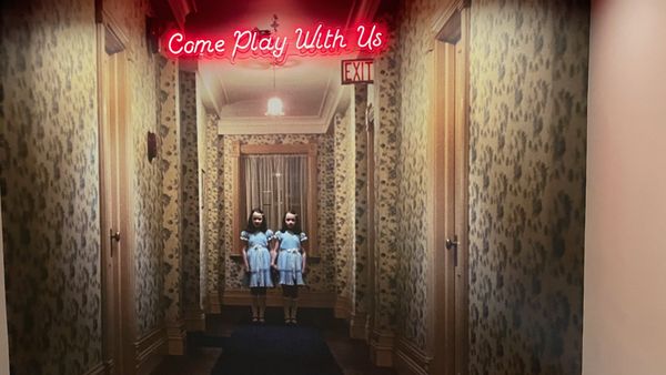 Inspired by the movie, The Shining, the Edina Theatre features a fun Grady Girls mural in the staircase up to the Gold Room Bar.