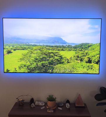 Wall mounted t.v. With led strip.