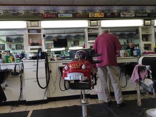 Great 'ole fashioned barber shop, James Lamb gives an awesome cut for $13.00.