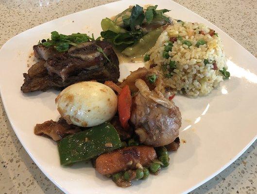 Main course with three different pinoy fusion dish fried rice, bake ribs, afritada, chopsuey