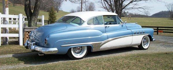 Buick show car shown with Truespoke Buick wire wheels and wide white wall tires.