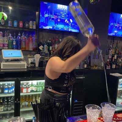 Bar tender serving us up!