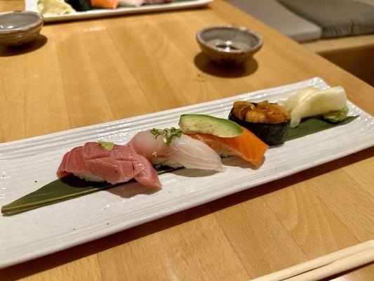 Omakase A - nigiri sushi including bluefin tuna, fatty tuna, amberjack, red snapper, salmon, and sea urchin