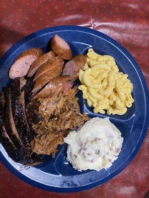 3 meat plate brisket pulled pork sausage.   Mac and cheese mashed potato