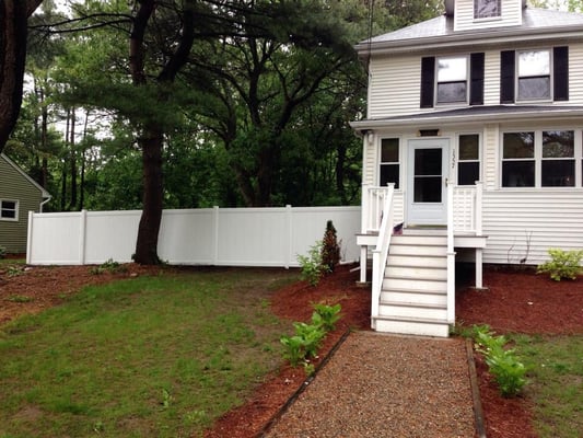 Removal of the old wooden fence and installation of the new vinyl privacy fence!