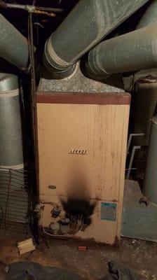 An old Lennox gravity furnace removed from service.