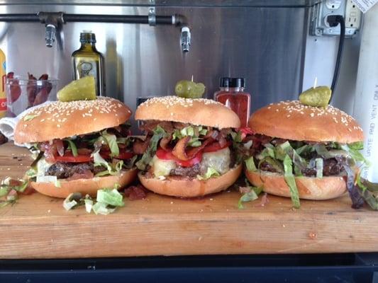 Organic beef, gruyere, onion jam, local butter leaf, and homemade aioli on a homemade sesame burger bun.