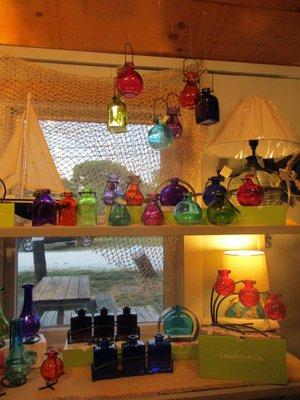 Hanging glass vases for rooting or flowers.