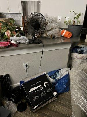 Trash left on counter from wrapping items that were already wrapped