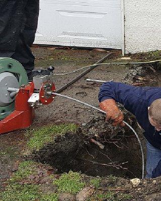 Drain cleaning after sewer has been backed up..