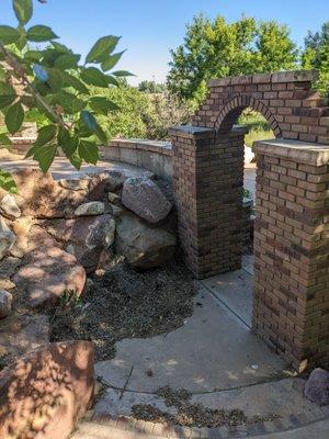 Concrete and brick archway, arch, sidewalk, decoration