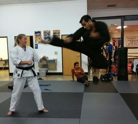 Vasquez Academy advanced karate students working on jump kicks