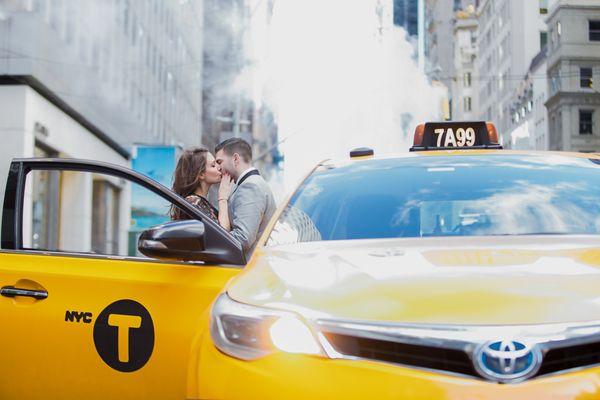 NYC Wedding Photographer: NYC Engagement Photo ideas with a Yellow Cab.