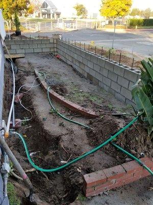 Block wall with pillars and rebar. 8×8×16 block