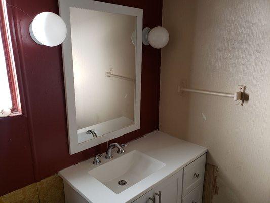 Installed new vanity and mirror for a happy customer!