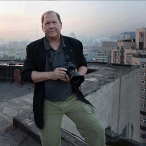 Serving DFW and the world with fresh images that communicate and sell.  Here's Jay perched on a rooftop in Beijing China.