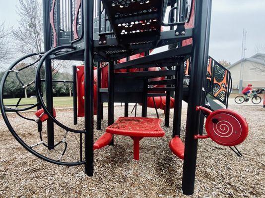 Green Park -- the larger of the playground structures (fire truck theme)/ integrated picnic table and climbing option